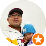 Customer holding a child